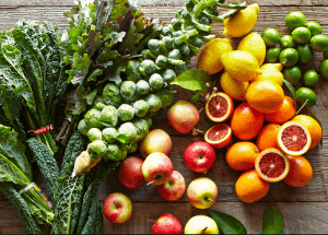 a group of fruits and vegetables on a wood surface Healthy Weight Loss Diets Southall